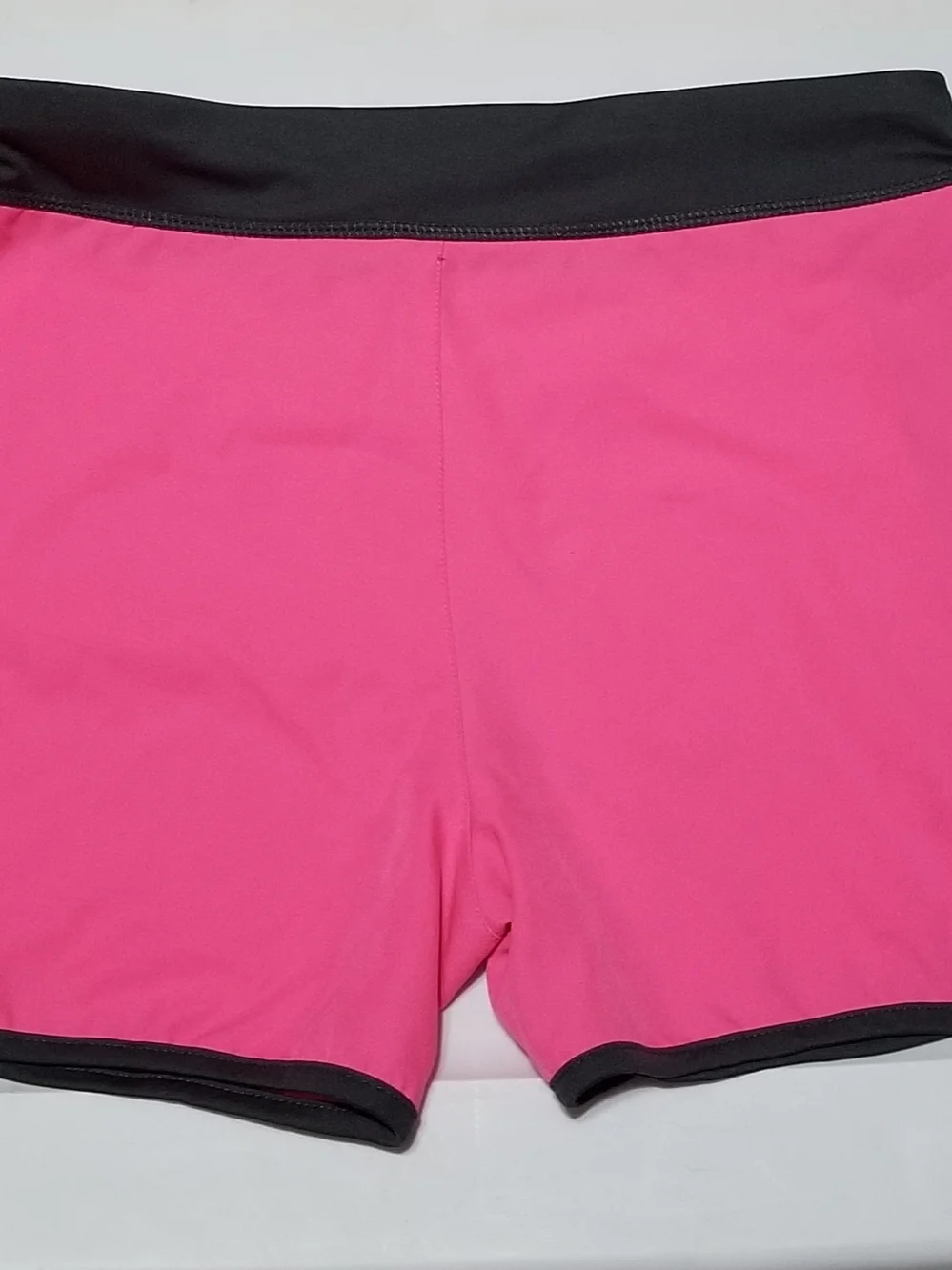 BCG Kid’s XL Bright Pink and Black Running Shorts With Black Mesh Side Panels